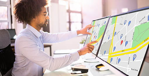 African American Man Doing Real Estate Online Search