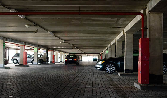 underground parking with cars in apartment 